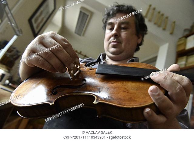 Violin maker Jan Bursik Jr is seen during a work at Atelier Bursik in Brno, Czech Republic, on November 10, 2017. Bursik violin makers family has been producing...