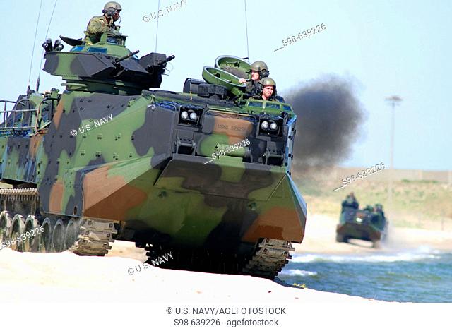 Virginia Beach, Va. (May 01, 2007) - Amphibious Assault Vehicles (AAV) maneuver on the beach as part of a comparison exhibit with the Expeditionary Fighting...