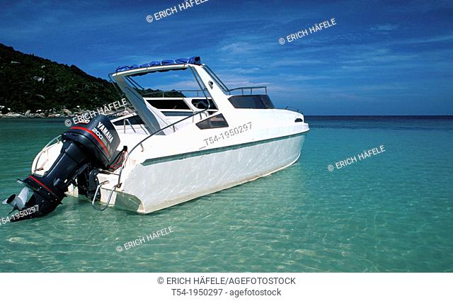 White motorboat on the beach of Ko Phangan