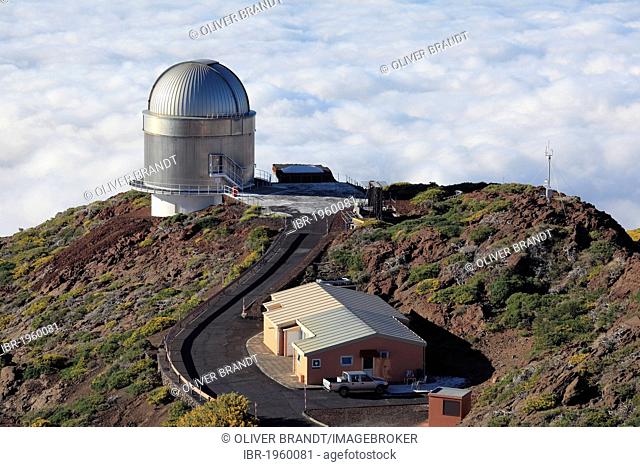 View over the cloud cover with Nordic Optical Telescope observatory, astronomical telescope, Roque de los Muchachos Observatory or Observatorio del Roque de los...