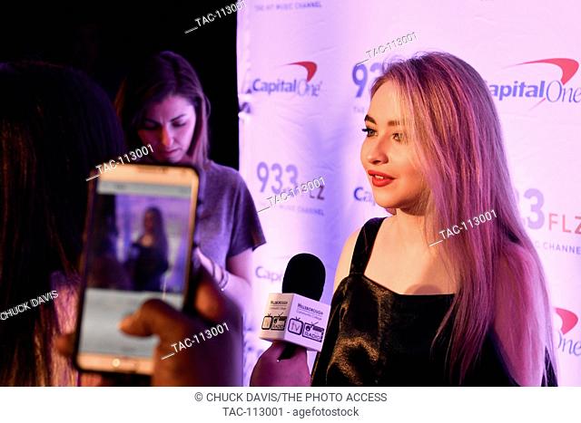 Sabrina Carpenter on the Red Carpet doing an interview at 93.3FLZ's iHeart Radio Jingle Ball at Amalie Arena in Tampa, FL on Dec 17, 2016