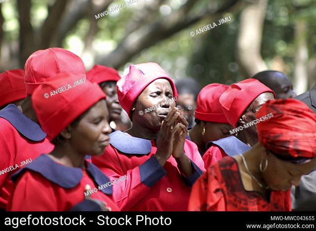 Women are seen praying in Africa Unity Square during the Easter Holiday. Many churches gather in the square during the Easter holidays. Zimbabwe