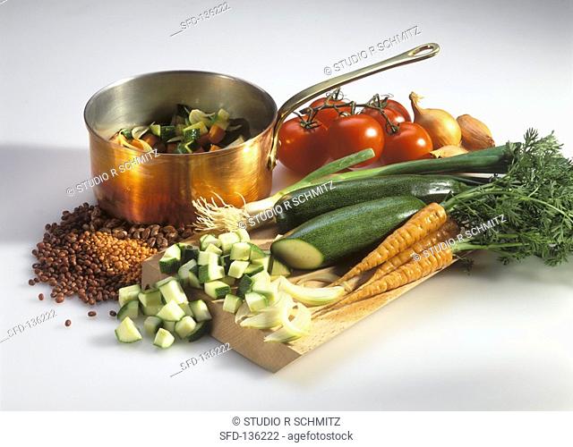 Assorted vegetables and pan of diced vegetables
