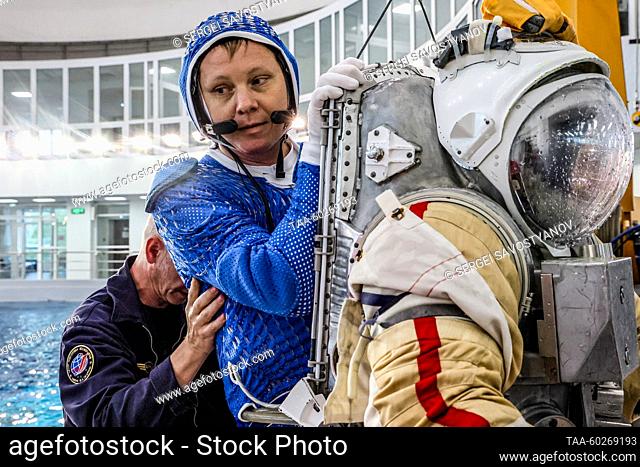 RUSSIA, MOSCOW REGION - JULY 5, 2023: Roscosmos cosmonaut Alexander Gorbunov takes off a space suit mock-up after a training simulation in a neutral buoyancy...