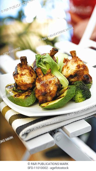 Teriyaki chicken legs with courgette, broccoli and pak choi