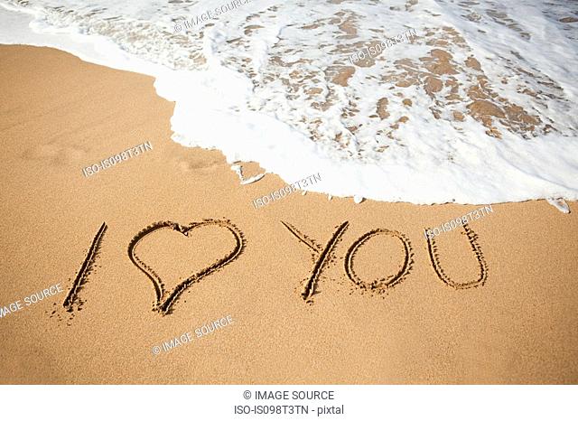 I love you written in sand