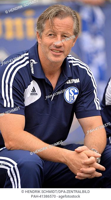 Schalke's head coach Jens Keller follows the friendly soccer match between 1. FC Lokomotive Leipzig and FC Schalke 04 and Bruno-Plache-Stadium in Leipzig