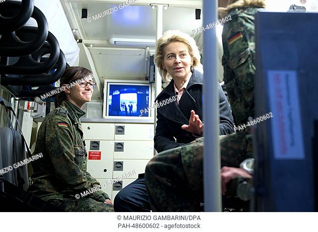 German Defence Minister Ursula von der Leyen sits in an ambulance car of soldiers of the Operational Reserve Force as she meets soldiers at Camp Prizren in...
