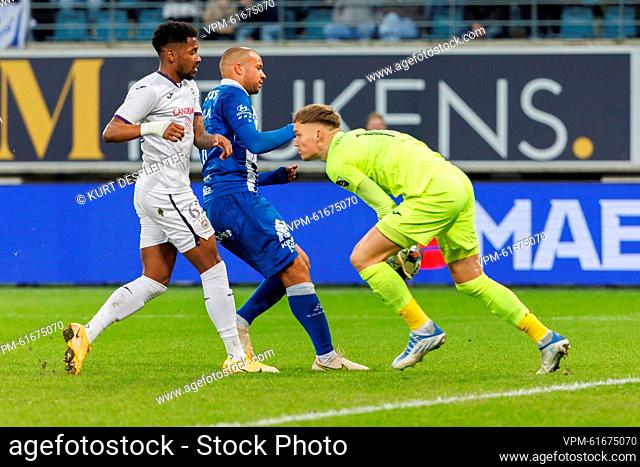 Anderlecht's Amir Murillo, Gent's Vadis Odjidja-Ofoe and Anderlecht's goalkeeper Bart Verbruggen fight for the ball during a soccer match between KAA Gent and...