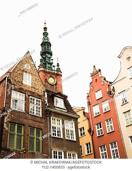 Townhouses in old town of Gdansk with tower of old town hall in the background