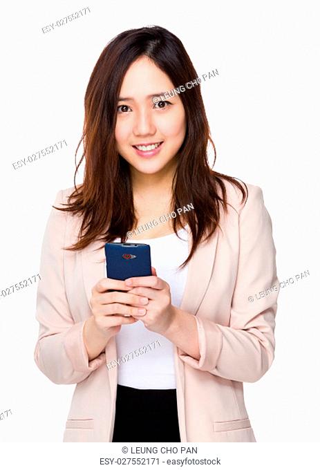 Asian businesswoman read the message on smart phone