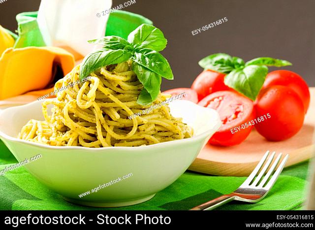 photo of delicious italian pasta with pesto sauce
