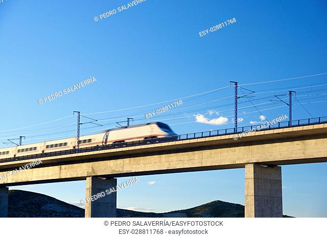 view of a high-speed train crossing a viaduct in Roden, Zaragoza, Aragon, Spain. AVE Madrid Barcelona