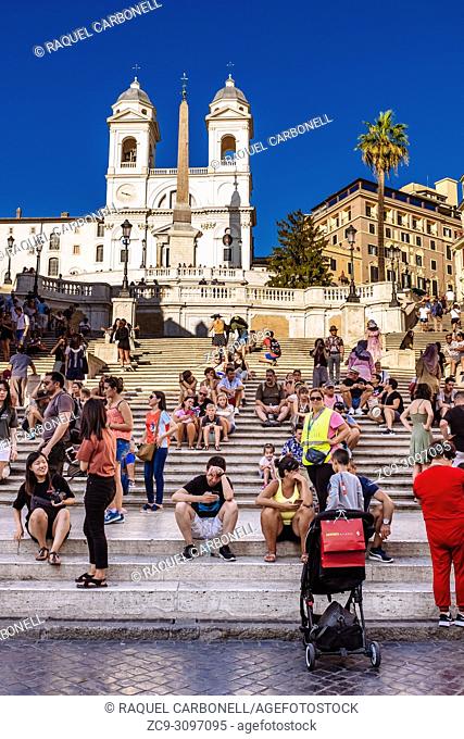 The church of the Santissima Trinita dei Monti, often called simply the TrinitÃ  dei Monti, above the Spanish Steps full of tourists which lead down to the...