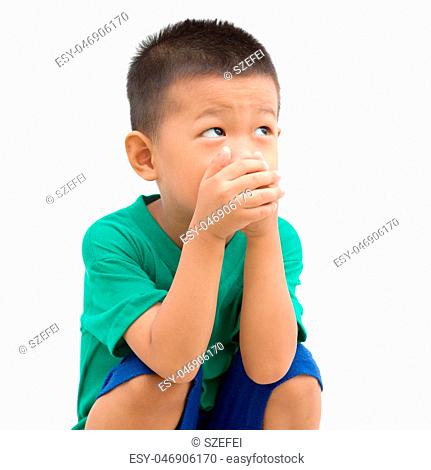 Asian boy covered mouth
