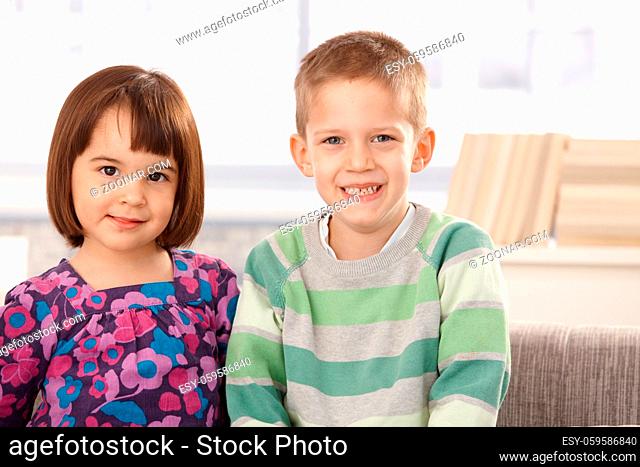 Portrait of cute small kids smiling at camera