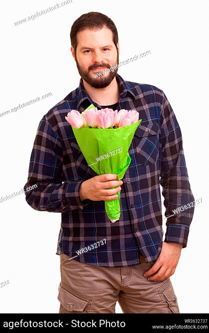Bearded young handsome man holding a bouquet of pink tulips, isolated on white background. Mothers day, Valentines day, Easter and surprise concept