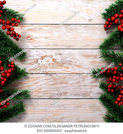 3D rendering light christmas wooden background with branches of fir and holly berries