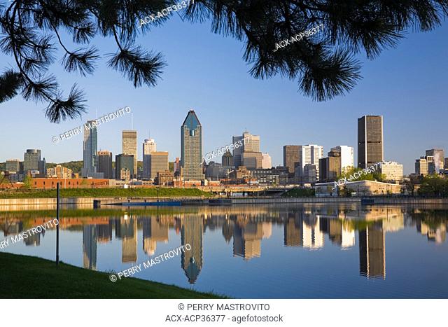 Montreal Skyline reflected in the Lachine Canal at Sunrise, Quebec, Canada