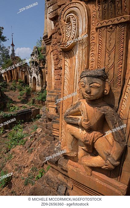 A Hindu figure is a decorative element on one of the hundreds of stupas at Indein near Inle Lake