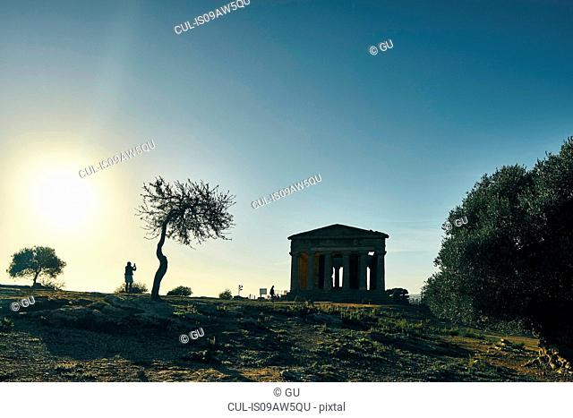Silhouetted view of Temple of Concordia, Valley of Temples, Agrigento, Sicily, Italy