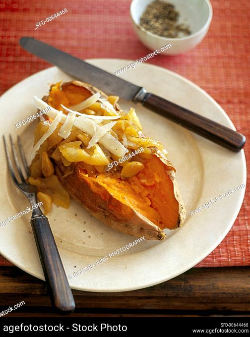 Baked sweet potato with onions and cheese