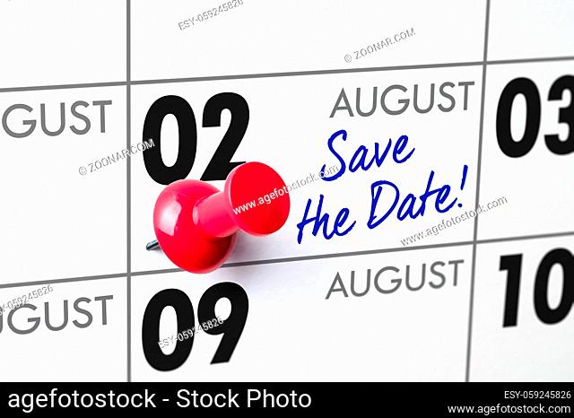 Wall calendar with a red pin - August 02