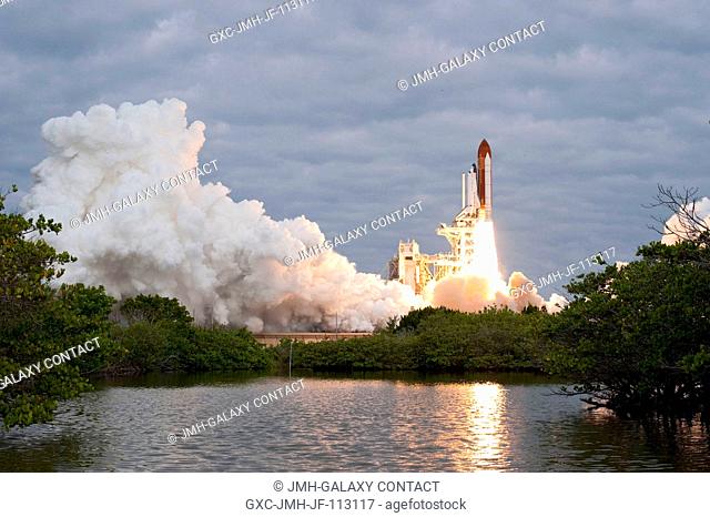 CAPE CANAVERAL, Fla. -- Amid the tranquility of a wildlife refuge, space shuttle Endeavour rumbles off Launch Pad 39A at NASA's Kennedy Space Center in Florida