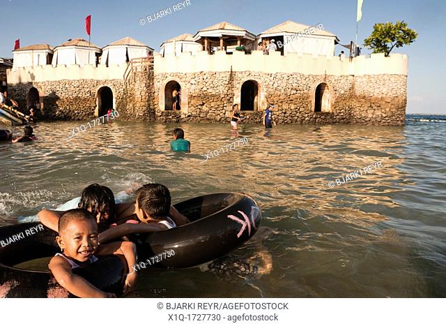 Filipino children playing in the water at Blue Reef Mactan Island Resort  Lapu-Lapu City, Metro Cebu, Mactan Island, Visayas, Philippines