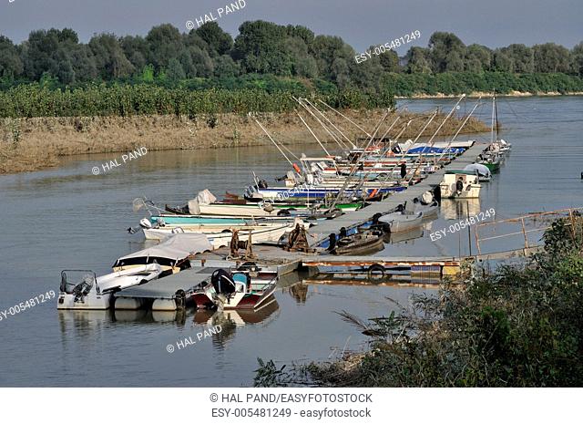 floating quay of harbour on a lateral ramification of po river, in emilia near parma