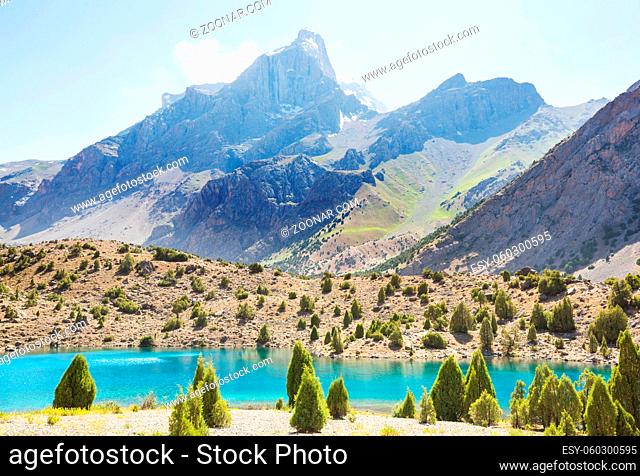 Beautiful serene lake in Fanns mountains (branch of Pamir) in Tajikistan