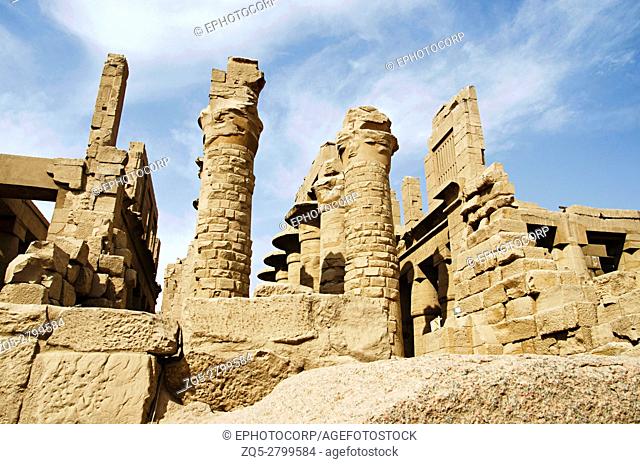 Inner view of a temple and carved pillars of the great hypostyle hall in the Precinct of Amon Re, Situated at Karnak Temple complex