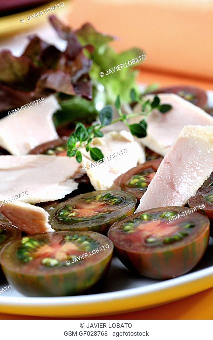 Tiger-striped tomatoes and tuna belly salad