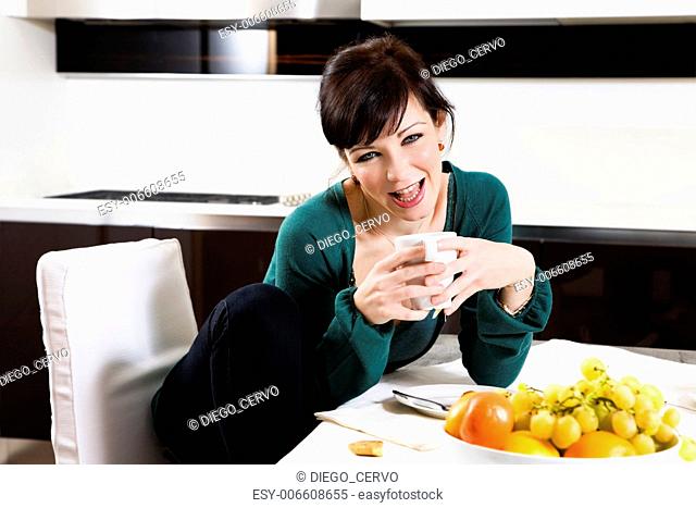 home life: woman drinking a cup of tea