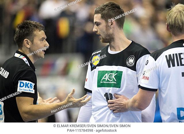 Hendrik PEKELER (right, GER) is coaching Christian PROKOP (GER), giving directions, instructions, preliminary round group A, Germany (GER) - France (FRA) 25:25