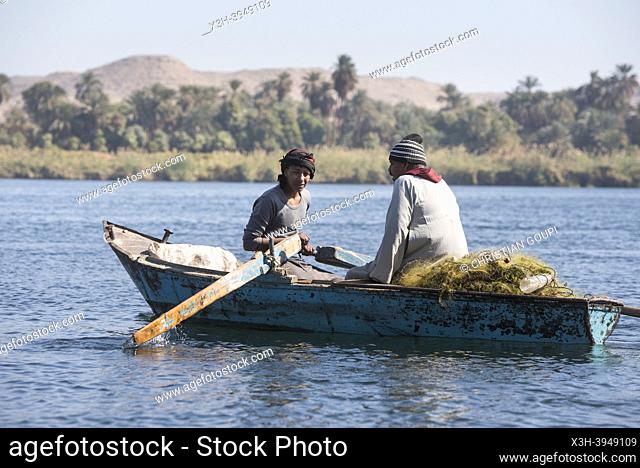 Net fishermen in rowing boat, village of Ramadi, west bank of the Nile south of Edfu, Egypt, North East Africa