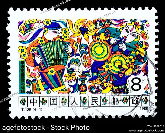 A stamp printed in China shows happiness in the countryside, circa 1988