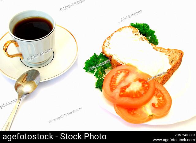 breakfast with bread, tomatoes and parsley on plate