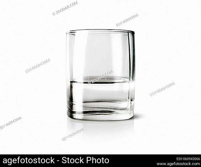 Glass with water on a light background