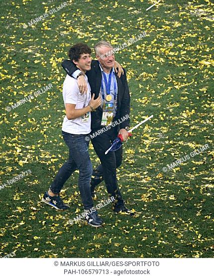 Coach Didier Deschamps (France) cheers after the award ceremony with his son Dylan Deschamps. GES / Football / World Championship 2018 Russia