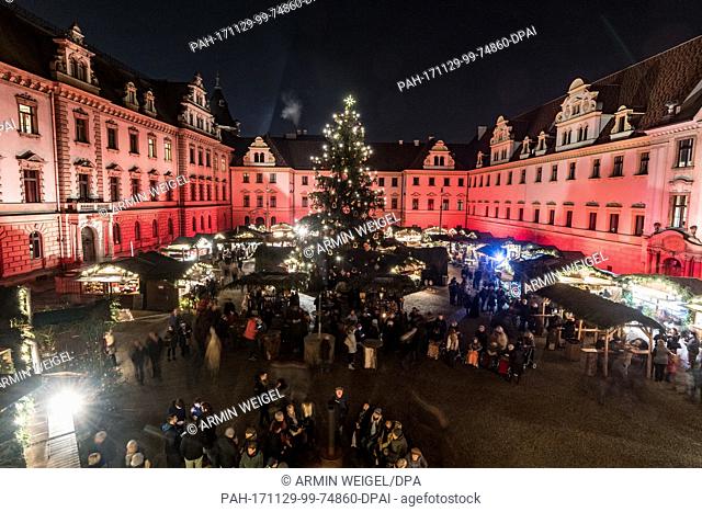 View of the romantic Christmas market at the St. Emmeram Castle, also known as Thurn und Taxis Castle, in Regensburg, Germany, 29 November 2017