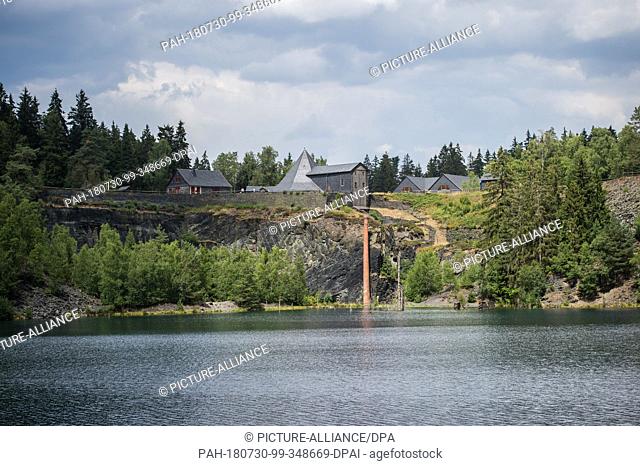 27 July 2018, Germany, Lehesten: View of the buildingw where horses were used in slate mining operations at the Lehesten Slate Park