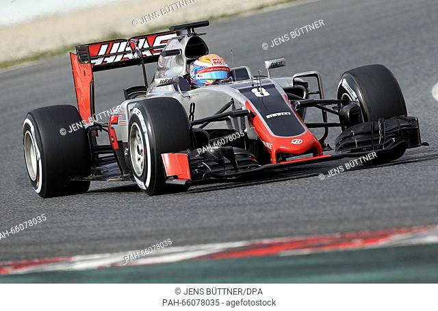 French Formula One driver Romain Grosjean of Haas F1 steers the new car VF-16 during a training session for the upcoming Formula One season at the Circuit de...