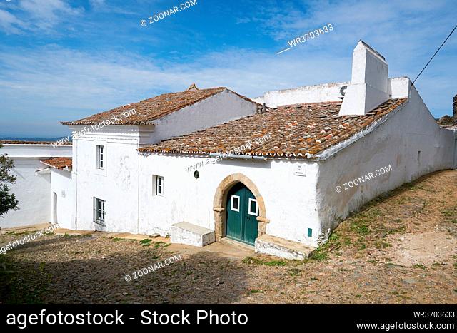 Evoramonte village street with white houses in Alentejo, Portugal