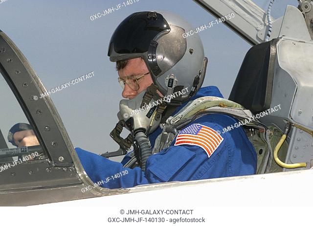 Astronaut James M. Kelly, STS-114 pilot, photographed in a T-38 trainer jet, prepares for a flight from Ellington Field near Johnson Space Center (JSC)