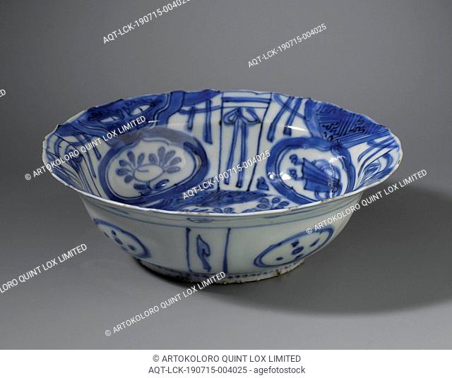 Folding cap bowl with a bird on a rock near flowering plants, Folding cap bowl of porcelain with a scalloped edge, painted in underglaze blue