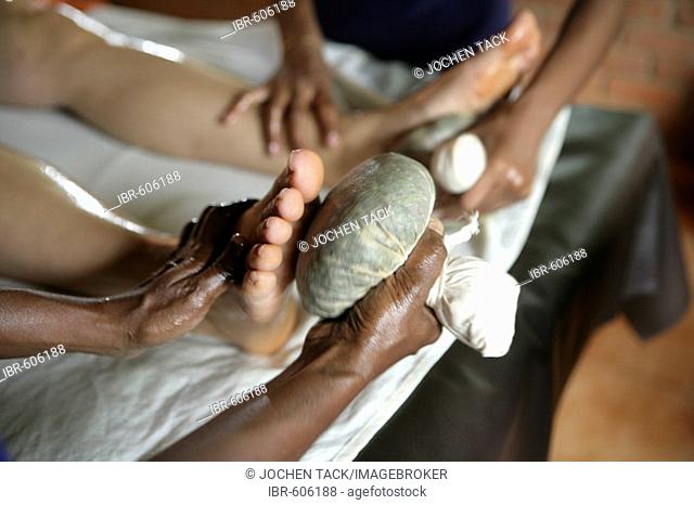 Foot massage using herb pouches, Somatheeram Ayurveda Resort, traditional Ayurvedic medicine spa resort in Trivandrum, Kerala, India, Asia