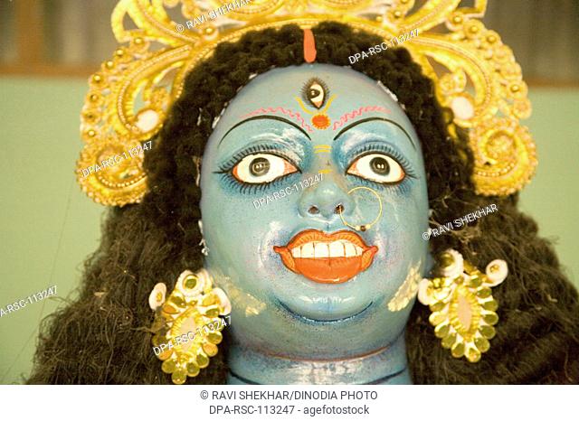 Statue of goddess Durga face blue Idol ; small village district Manik gunj ; Bangladesh