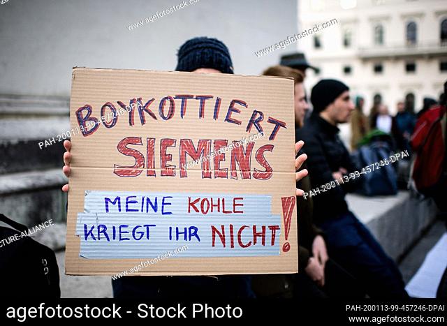 13 January 2020, Bavaria, Munich: During a Fridays for Future protest in front of Siemens headquarters on Wittelsbacher Platz