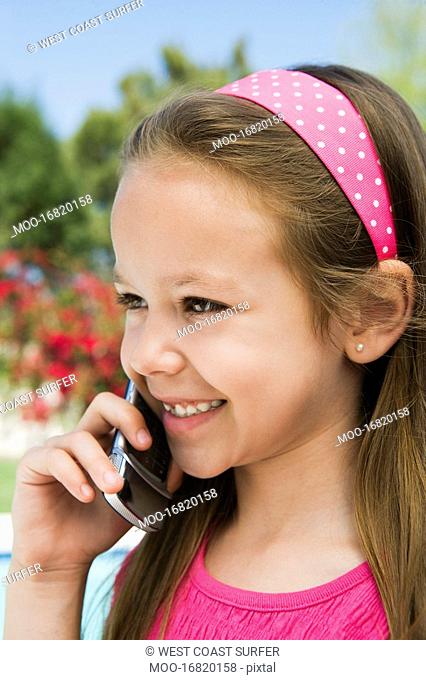 Young Girl Using Cell Phone